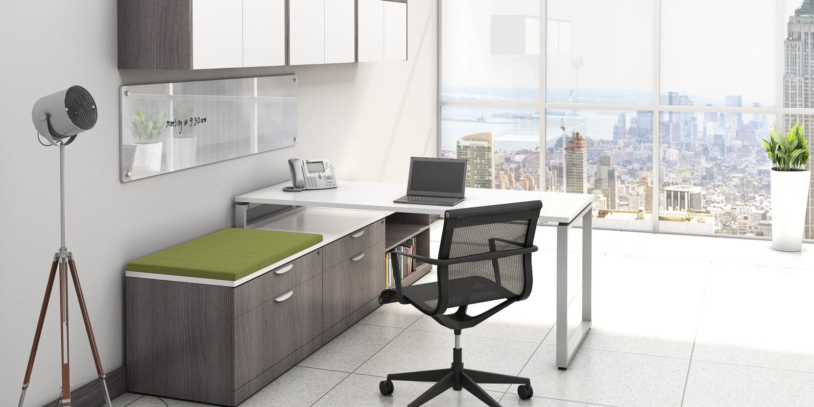 A chair and desk in an office with a view of the city.